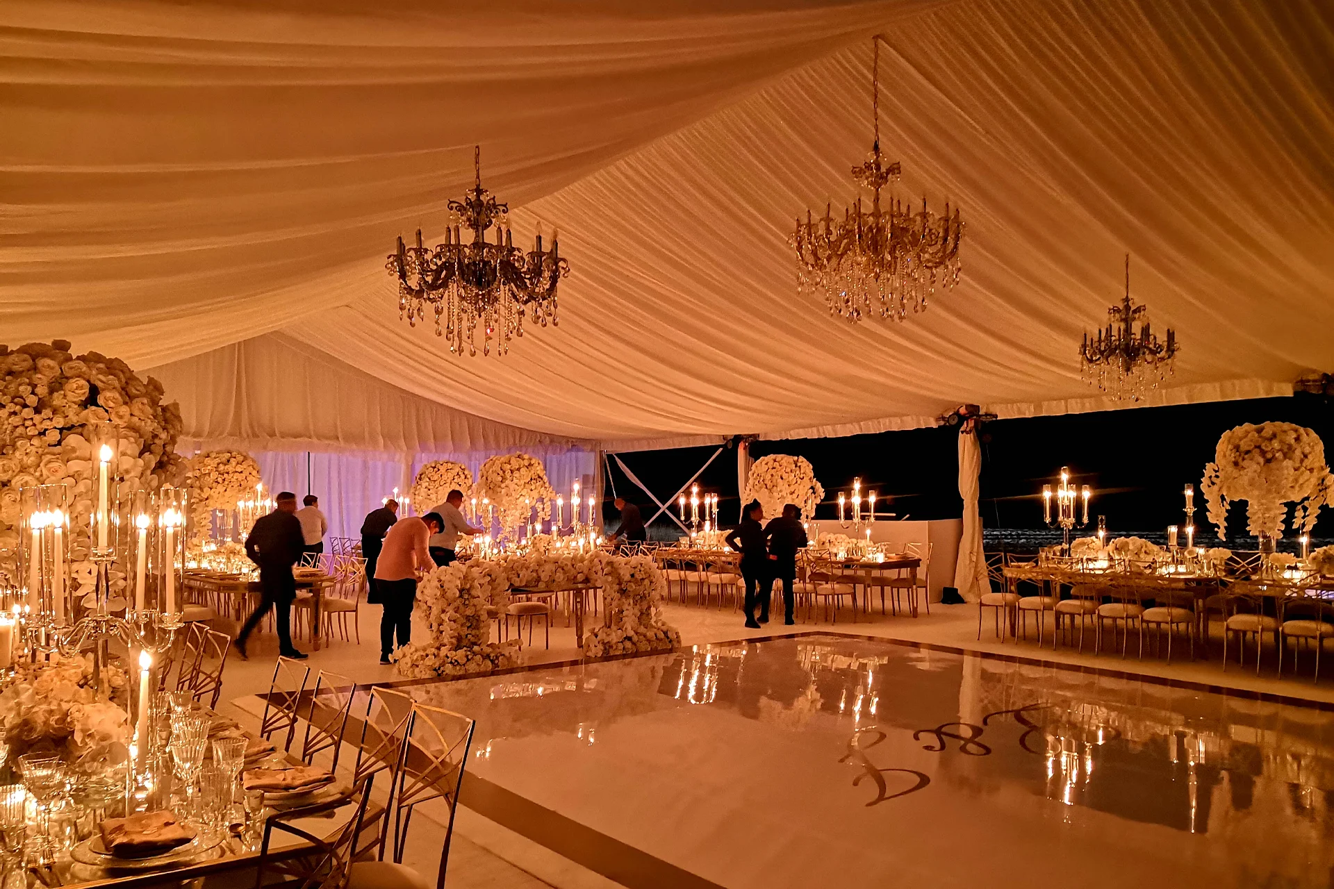 Interior of a luxurious event covered with white curtains